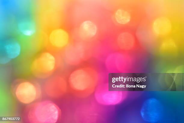 defocused lights - multi coloured lights stock pictures, royalty-free photos & images