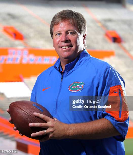 In this Aug. 9, 2015 file photo, Jim McElwain --then the new head football coach at the University of Florida -- poses during a photo shoot with the...