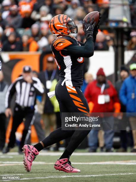 Carlos Dunlap of the Cincinnati Bengals intercepts a pass against the Indianapolis Colts at Paul Brown Stadium on October 29, 2017 in Cincinnati,...