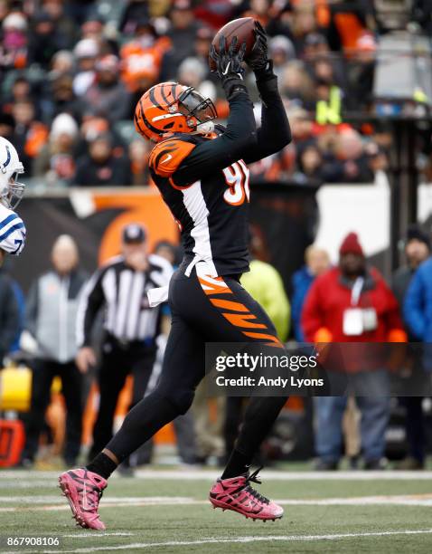 Carlos Dunlap of the Cincinnati Bengals intercepts a pass against the Indianapolis Colts at Paul Brown Stadium on October 29, 2017 in Cincinnati,...