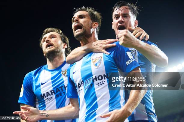 Adrian Gonzalez of Malaga CF celebrates after scoring the first goal for Malaga of CF with his team mate Juan Pablo Anor "Juanpi" of Malaga CF during...