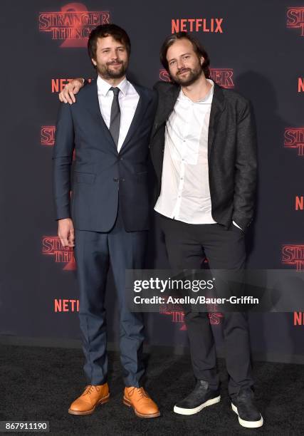 Creators Ross Duffer and Matt Duffer arrive at the premiere of Netflix's 'Stranger Things' Season 2 at Regency Bruin Theatre on October 26, 2017 in...