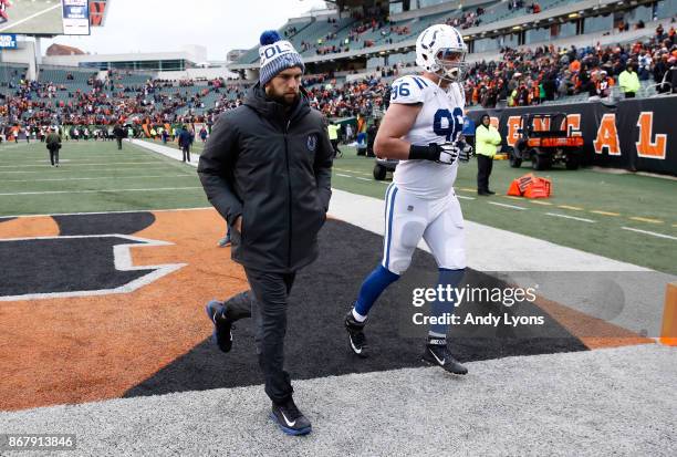 Andrew Luck of the Indianapolis Colts walks off of the field following the 24-23 loss against the Cincinnati Bengals at Paul Brown Stadium on October...