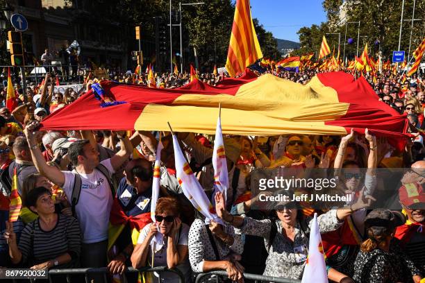 Thousands of pro-unity protesters gather in Barcelona, two days after the Catalan parliament voted to split from Spain, on October 29, 2017 in...