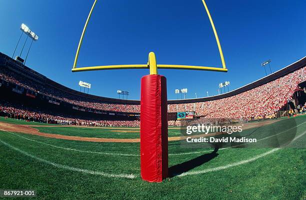 american football stadium, wide angle of goal post - goal posts stockfoto's en -beelden