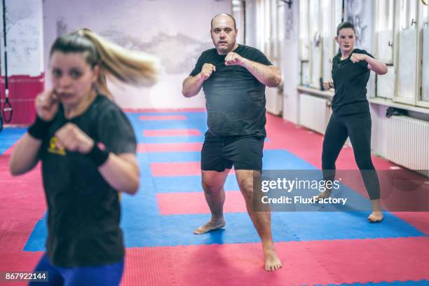 resist to give up - martial arts training stock pictures, royalty-free photos & images