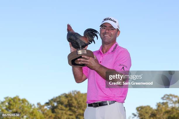 Ryan Armour poses with the trophy after winning the Sanderson Farms Championship at the Country Club of Jackson on October 29, 2017 in Jackson,...