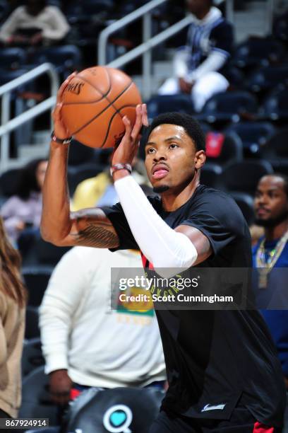 Kent Bazemore of the Atlanta Hawks shoots the ball during warmups before the game against the Milwaukee Bucks on October 29, 2017 at Philips Arena in...