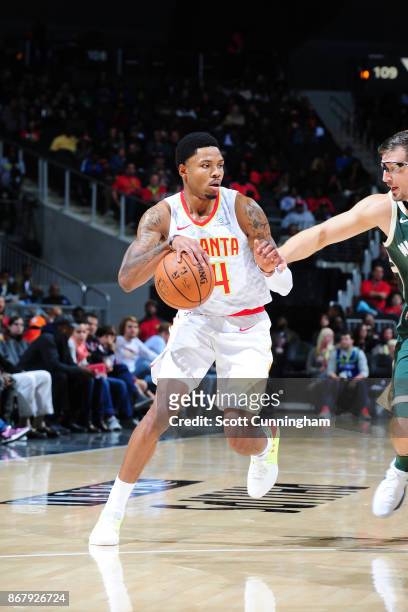Kent Bazemore of the Atlanta Hawks handles the ball against the Milwaukee Bucks on October 29, 2017 at Philips Arena in Atlanta, Georgia. NOTE TO...