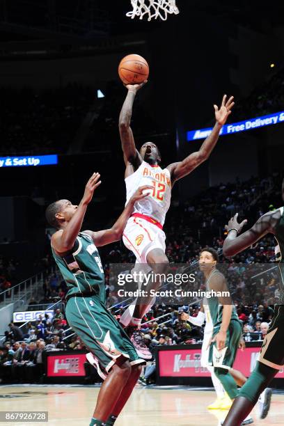 Taurean Prince of the Atlanta Hawks drives to the basket against the Milwaukee Bucks on October 29, 2017 at Philips Arena in Atlanta, Georgia. NOTE...