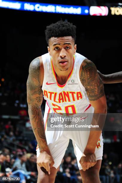 John Collins of the Atlanta Hawks looks on during the game against the Milwaukee Bucks on October 29, 2017 at Philips Arena in Atlanta, Georgia. NOTE...