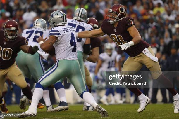 Outside linebacker Ryan Kerrigan of the Washington Redskins sacks quarterback Dak Prescott of the Dallas Cowboys during the second quarter at FedEx...