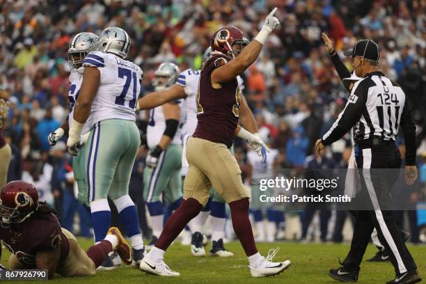 Outside linebacker Ryan Kerrigan of the Washington Redskins celebrates after sacking quarterback Dak Prescott of the Dallas Cowboys during the second...