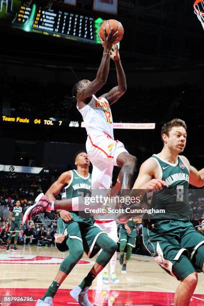 Taurean Prince of the Atlanta Hawks drives to the basket against the Milwaukee Bucks on October 29, 2017 at Philips Arena in Atlanta, Georgia. NOTE...