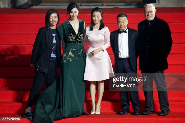 Actress Fan Bingbing, actress Zhao Tao and director Jia Zhangke arrive at the red carpet of the 1st Pingyao Crouching Tiger Hidden Dragon...