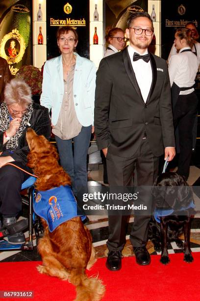 Vita Team Richard Rice and his assistance dog Abby during the 8th VITA Charity Gala In Wiesbaden on October 28, 2017 in Wiesbaden, Germany.