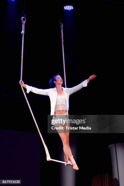 Trapeze artist Meike Silja perform during the 8th VITA Charity Gala In Wiesbaden on October 28, 2017 in Wiesbaden, Germany.