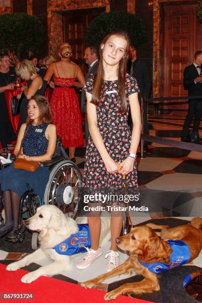 Vita Team Sophia Brandner and her assistance dog Querido during the 8th VITA Charity Gala In Wiesbaden on October 28, 2017 in Wiesbaden, Germany.