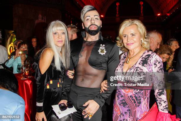 Rita-Thea Schmidt, designer Harald Gloeoeckler and Tessy Pavelkova during the 8th VITA Charity Gala In Wiesbaden on October 28, 2017 in Wiesbaden,...