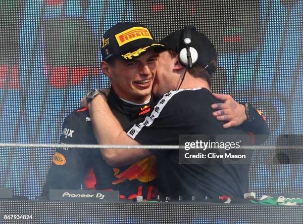 International Dutch DJ, Hardwell congratulates race winner Max Verstappen of Netherlands and Red Bull Racing on the podium the Formula One Grand Prix...