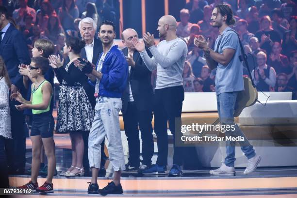 Peter Weck, Bill Kaulitz, Bernhard Hoecker and Tom Kaulitz during the TV show 'Klein gegen Gross - Das unglaubliche Duell' at Studio Berlin on...