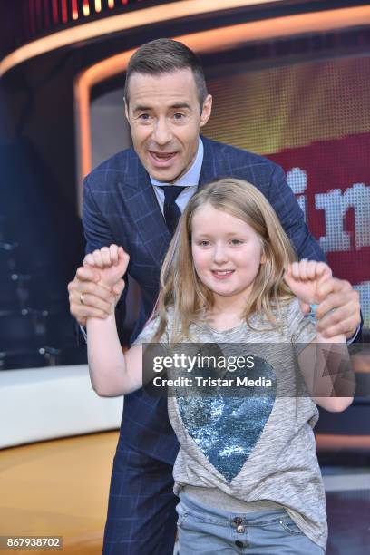 Kai Pflaume and a kid candidate during the TV show 'Klein gegen Gross - Das unglaubliche Duell' at Studio Berlin on October 29, 2017 in Berlin,...