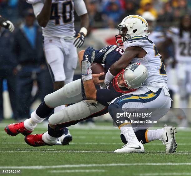 New England Patriots quarterback Tom Brady is sacked by the Chargers Desmond King in the third quarter. The New England Patriots host the Los Angeles...