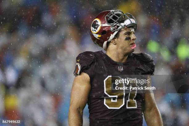 Outside linebacker Ryan Kerrigan of the Washington Redskins looks on against the Dallas Cowboys during the fourth quarter at FedEx Field on October...