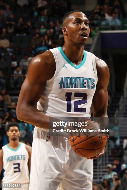 Dwight Howard of the Charlotte Hornets shoots a free throw during the game against the Orlando Magic on October 29, 2017 at Spectrum Center in...
