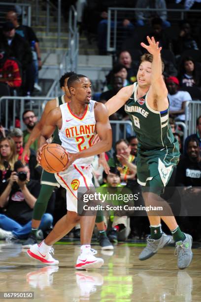 Isaiah Taylor of the Atlanta Hawks handles the ball against the Milwaukee Bucks on October 29, 2017 at Philips Arena in Atlanta, Georgia. NOTE TO...