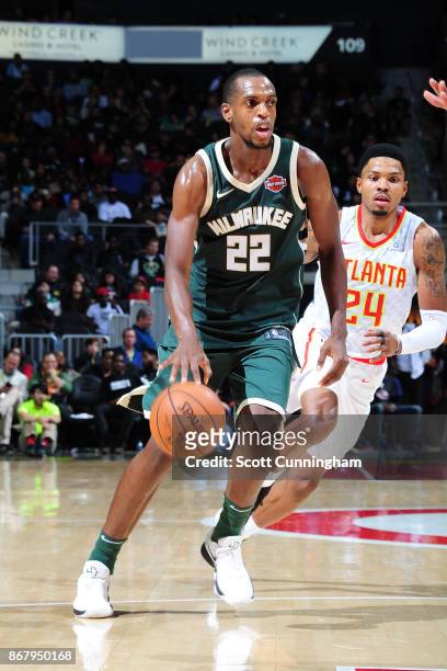 Khris Middleton of the Milwaukee Bucks handles the ball against the Atlanta Hawks on October 29, 2017 at Philips Arena in Atlanta, Georgia. NOTE TO...