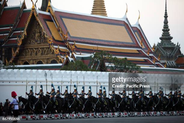 The king guard cavalry during a procession to transfer His Majesty the late King Bhumibol Adulyadejs royal relics and ashes from Phra Si Rattana...