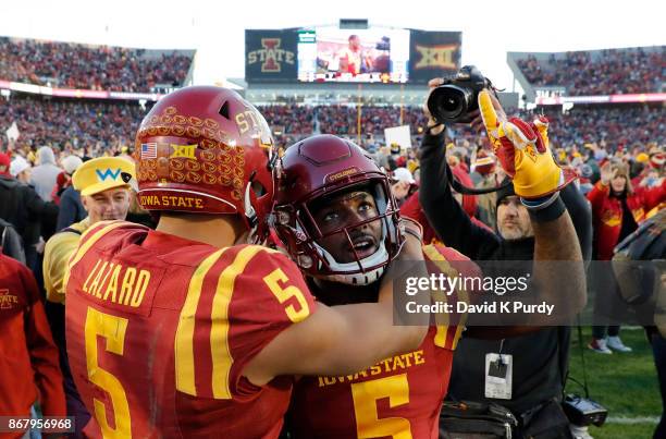 Defensive back Kamari Cotton-Moya, right, celebrates with wide receiver Allen Lazard of the Iowa State Cyclones after defeating the TCU Horned Frogs...