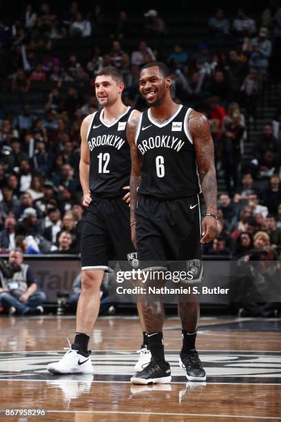 Joe Harris of the Brooklyn Nets and Sean Kilpatrick of the Brooklyn Nets react during the game against the Denver Nuggets on October 29, 2017 at...