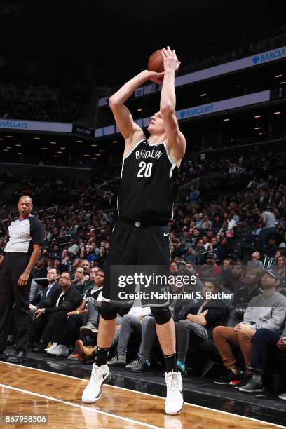 Timofey Mozgov of the Brooklyn Nets shoots the ball against the Denver Nuggets on October 29, 2017 at Barclays Center in Brooklyn, New York. NOTE TO...