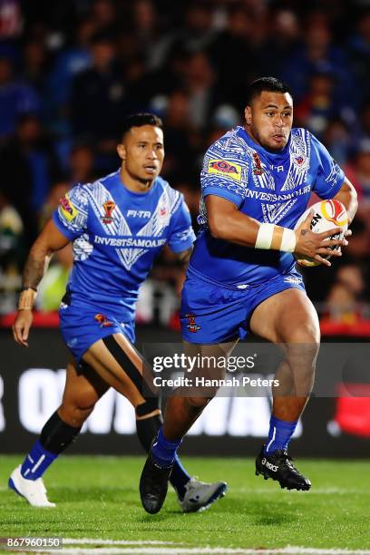 Sam Lisone of Samoa charges forward during the 2017 Rugby League World Cup match between the New Zealand Kiwis and Samoa at Mt Smart Stadium on...