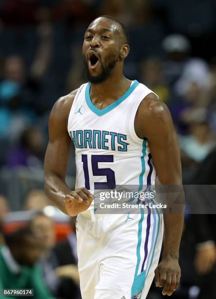 Kemba Walker of the Charlotte Hornets reacts after a play against the Orlando Magic during their game at Spectrum Center on October 29, 2017 in...