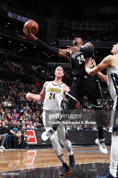 Rondae Hollis-Jefferson of the Brooklyn Nets drives to the basket against the Denver Nuggets on October 29, 2017 at Barclays Center in Brooklyn, New...