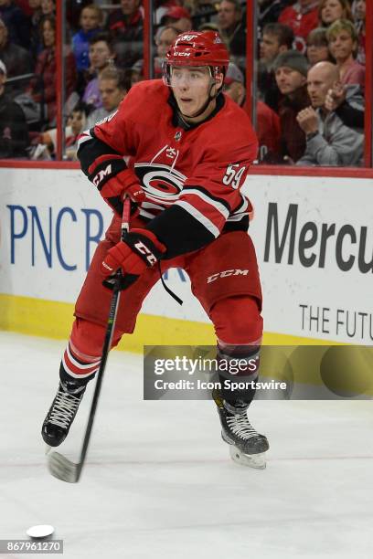 Carolina Hurricanes Winger Janne Kuokkanen passes the puck up ice during a game between the Anaheim Ducks and the Carolina Hurricanes at the PNC...