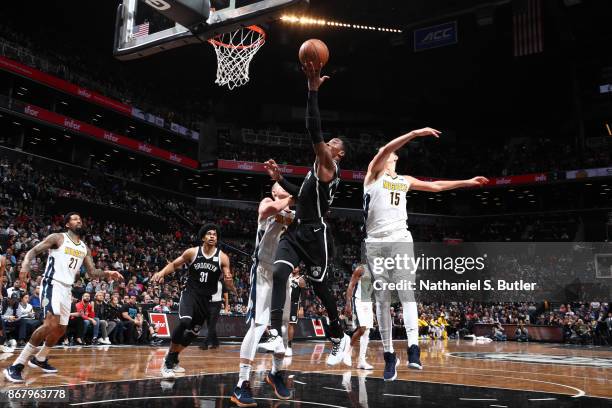 Rondae Hollis-Jefferson of the Brooklyn Nets drives to the basket against the Denver Nuggets on October 29, 2017 at Barclays Center in Brooklyn, New...