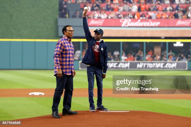 Former Houston Astros player Jose Cruz and Aaron Lewis from the Boys & Girls Club of America deliver the first ball prior to Game 5 of the 2017 World...