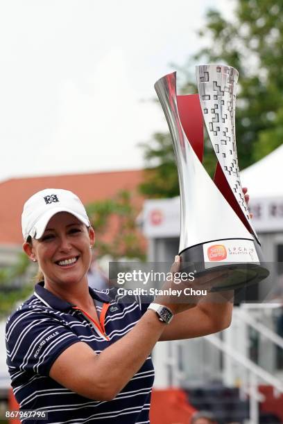 Cristie Kerr of the United States poses with the Sime Darby LPGA trophy after she won it by 15 under 269 during day four of the Sime Darby LPGA...