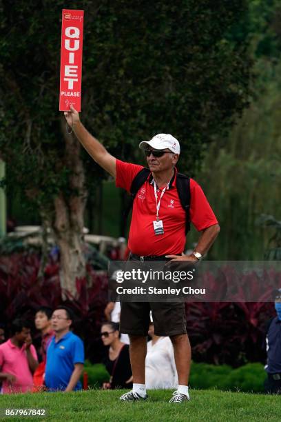 Volunteer holds up the quite sign during day four of the Sime Darby LPGA Malaysia at TPC Kuala Lumpur East Course on October 29, 2017 in Kuala...