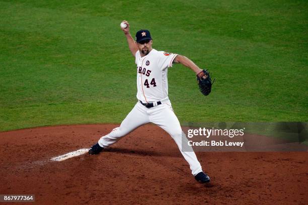 Luke Gregerson of the Houston Astros throws a pitch during the fourth inning against the Los Angeles Dodgers in game five of the 2017 World Series at...