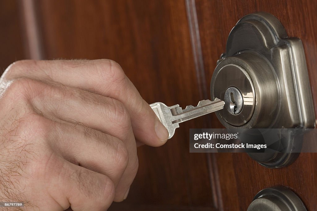 Hand unlocking door