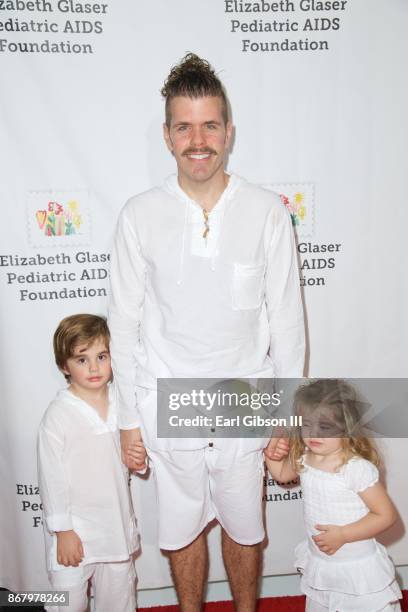 Perez Hilton , Mario Armando Lavandeira III, and Mia Alma Lavanderia attend The Elizabeth Glaser Pediatric AIDS Foundation's 28th Annual 'A Time For...