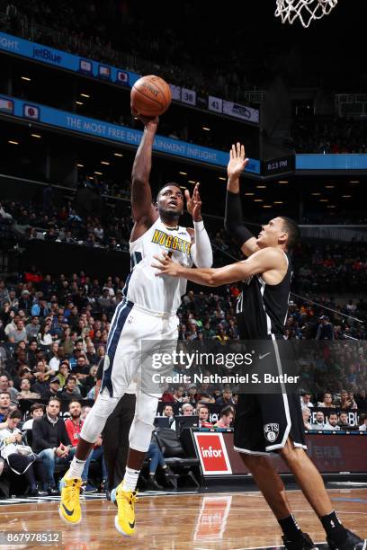 Paul Millsap of the Denver Nuggets shoots the ball against the Brooklyn Nets on October 29, 2017 at Barclays Center in Brooklyn, New York. NOTE TO...