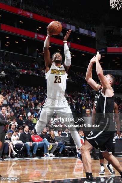 Malik Beasley of the Denver Nuggets drives to the basket against the Brooklyn Nets on October 29, 2017 at Barclays Center in Brooklyn, New York. NOTE...