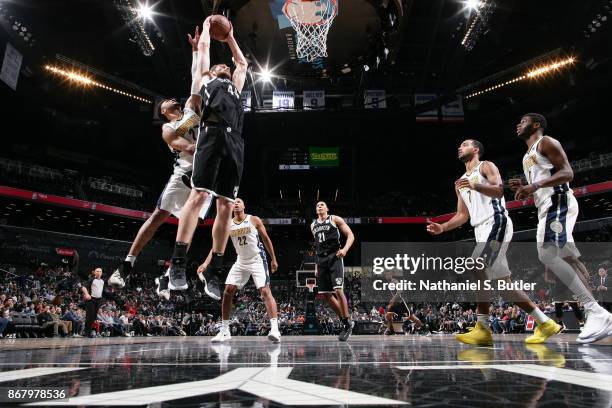 Tyler Zeller of the Brooklyn Nets drives to the basket against the Denver Nuggets on October 29, 2017 at Barclays Center in Brooklyn, New York. NOTE...