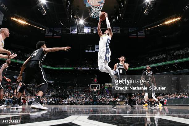 Gary Harris of the Denver Nuggets drives to the basket against the Brooklyn Nets on October 29, 2017 at Barclays Center in Brooklyn, New York. NOTE...
